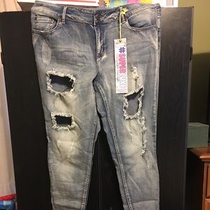 Brand new skinny jeans with fashion rips
